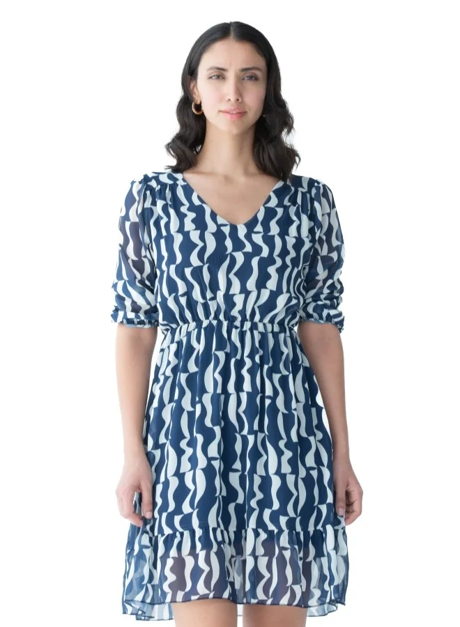 زابايوني This elegant dress features a unique blue pattern, perfect for casual and formal occasions.