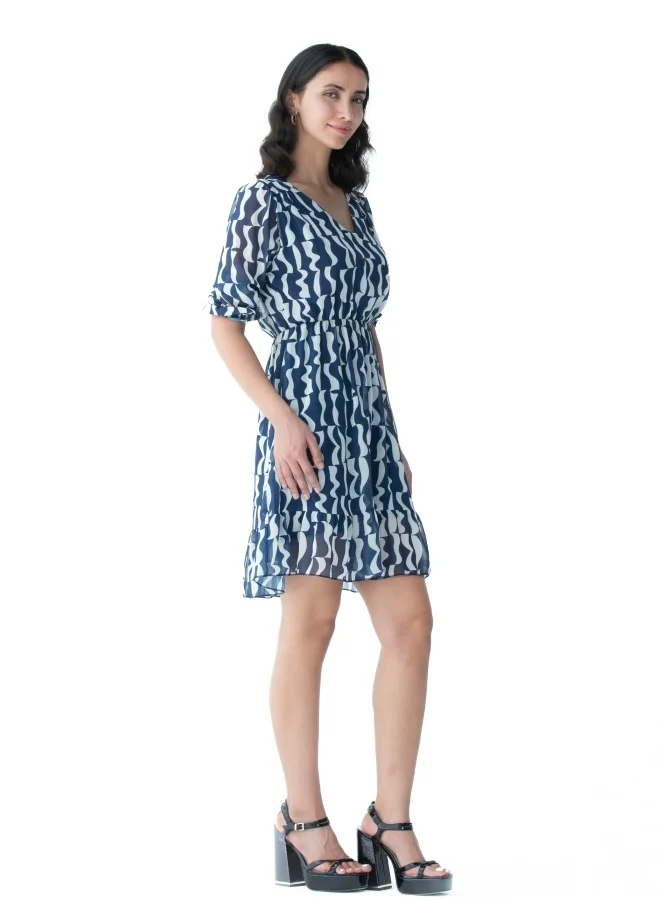 زابايوني This elegant dress features a unique blue pattern, perfect for casual and formal occasions.