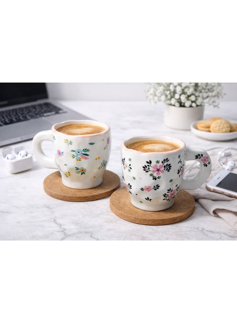 Set of 2 artistic ceramic cups with soft floral and bird designs in a pastel touch on a white background, 300ml capacity per cup, ideal for coffee, latte, or tea with a comfortable handle and elegant design. - Image 2