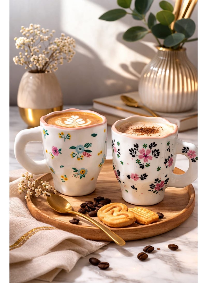 Set of 2 artistic ceramic cups with soft floral and bird designs in a pastel touch on a white background, 300ml capacity per cup, ideal for coffee, latte, or tea with a comfortable handle and elegant design. - Image 4