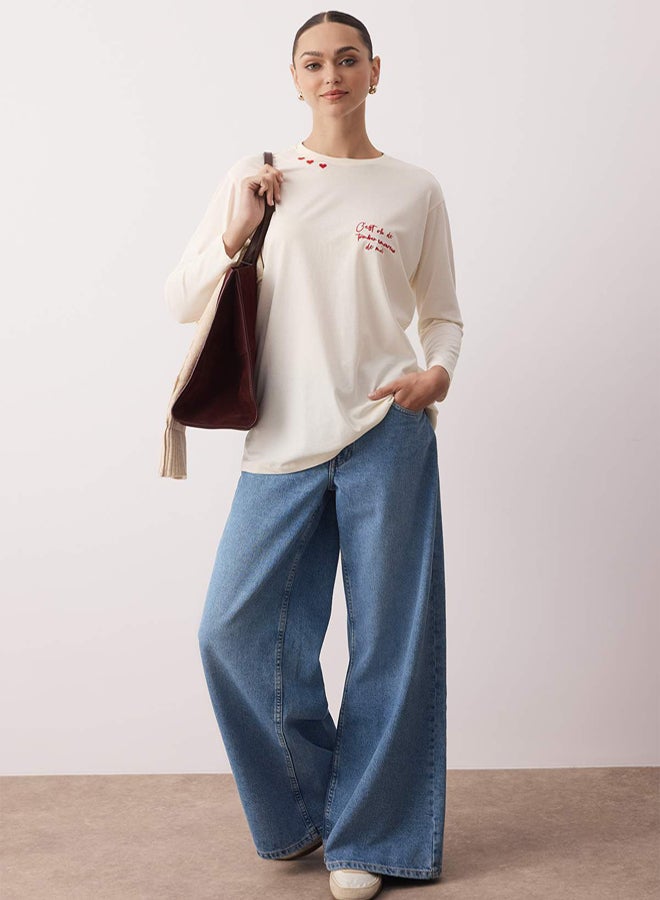 trendyol Ecru Oversize Single Jersey Fabric Embroidery Detailed Plain Knitted Tunic - Image 1