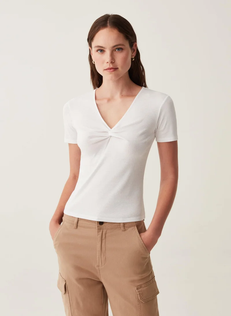 او في اس T-Shirt With V Neck And Knot