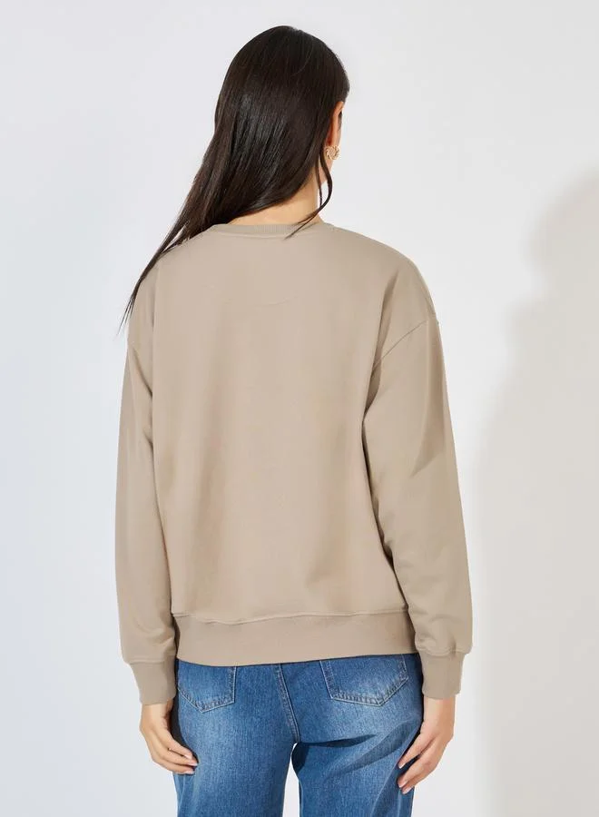 Styli Regular Fit Longline Graphic Sweatshirt with Neck Rib Detail