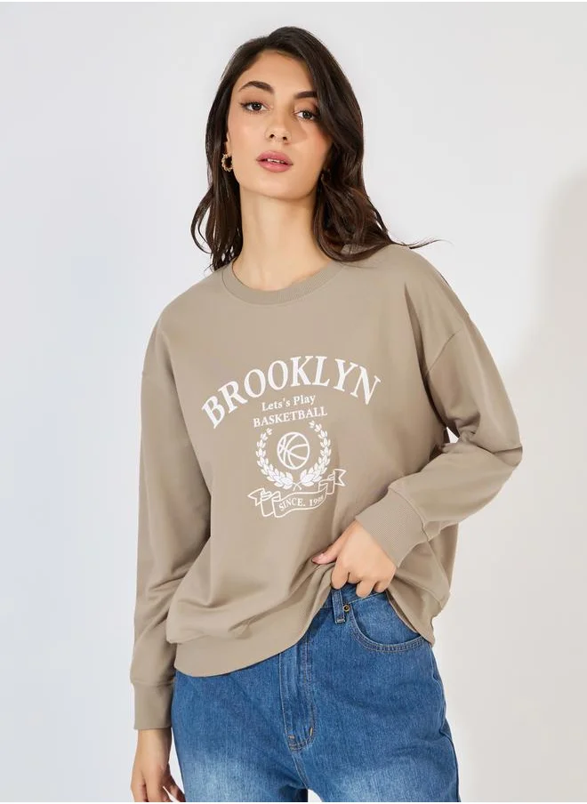 Styli Regular Fit Longline Graphic Sweatshirt with Neck Rib Detail