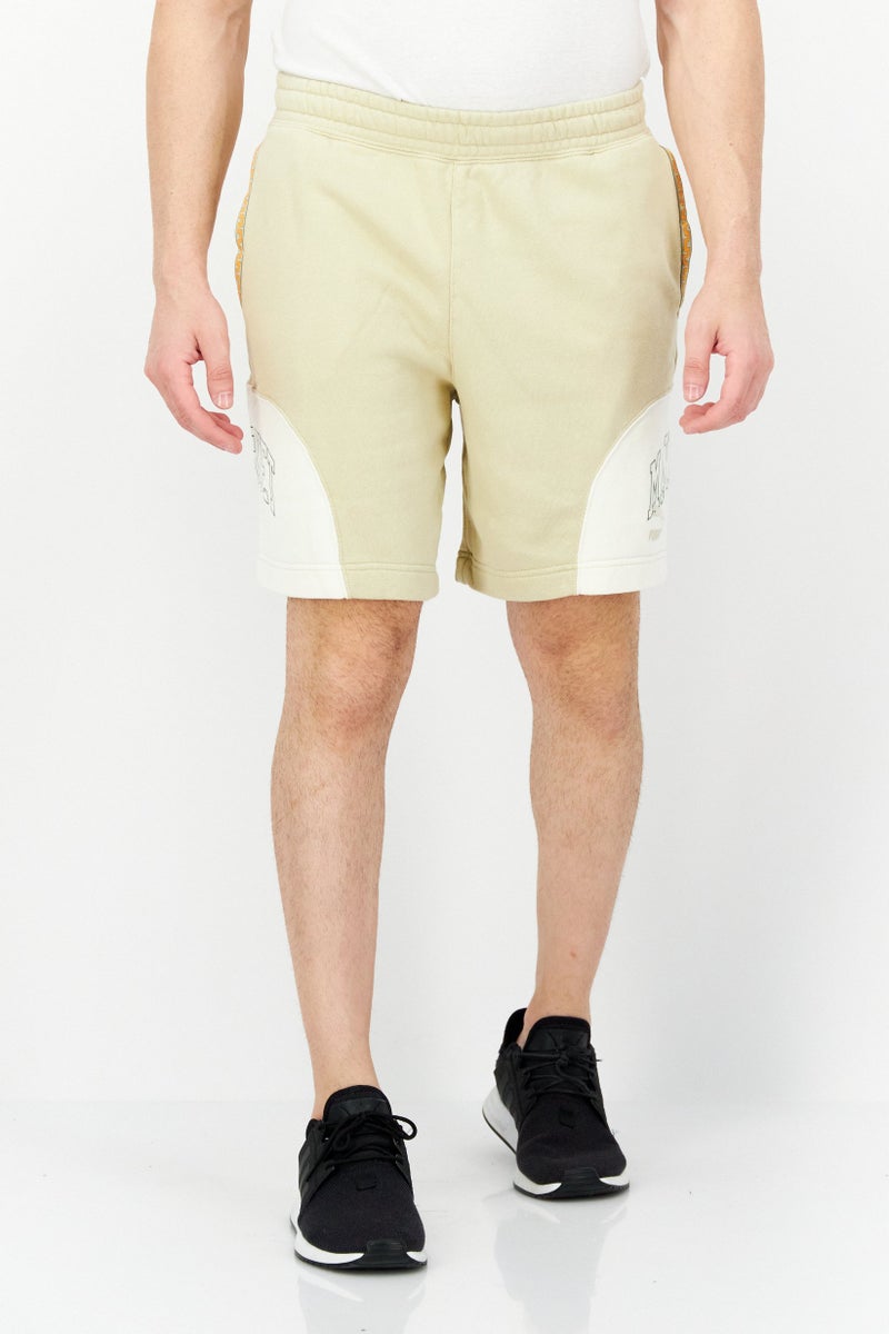 Puma x Market Men Sportswear Fit Brand Logo Training Shorts, Khaki - Image 1