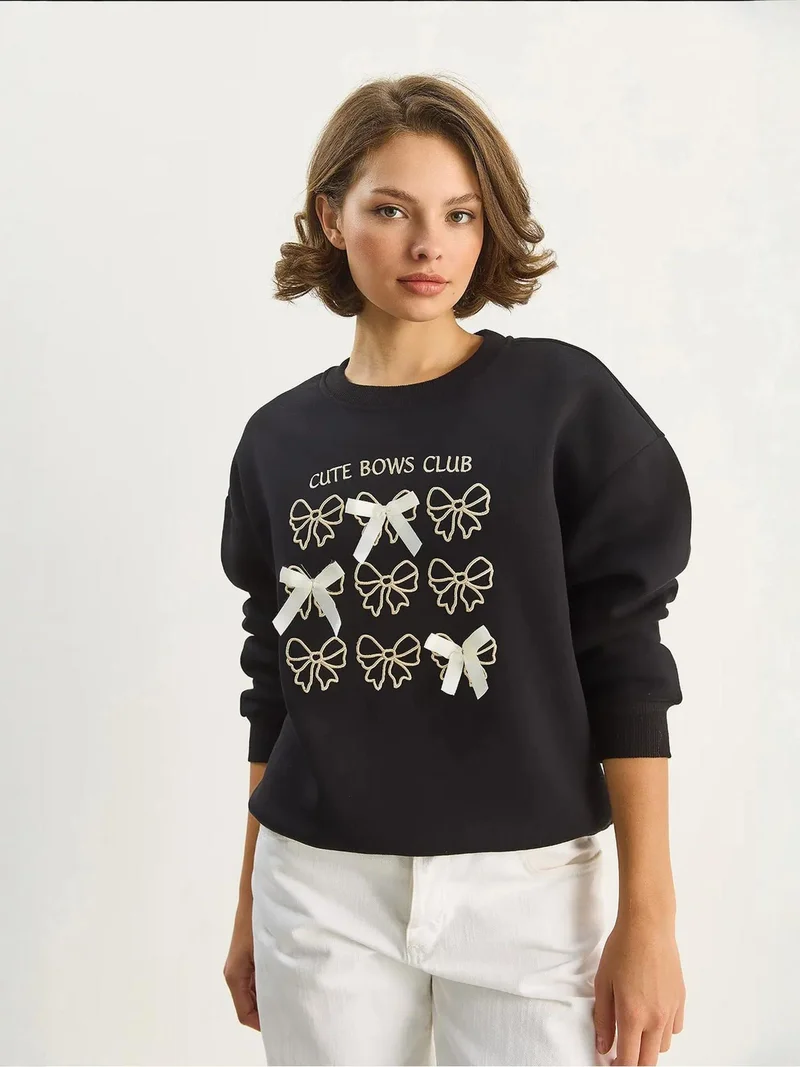 بيانكو لوتشي بلوفر لوكسي مطبوع بياقة دائرية وأكمام طويلة