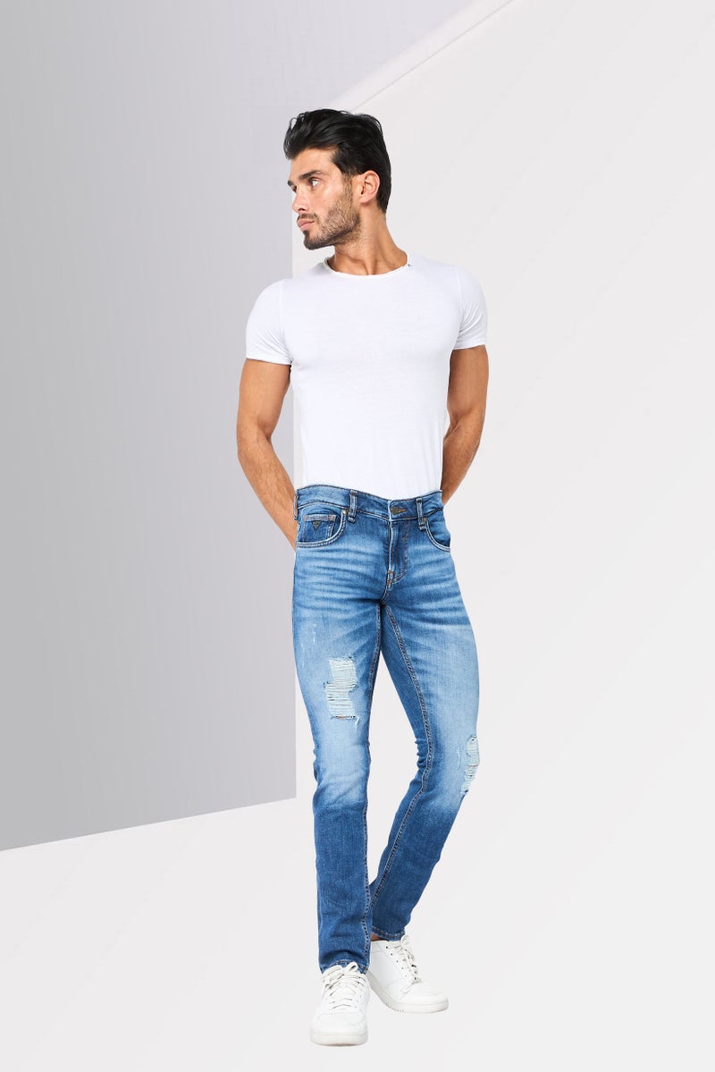 GUESS جينز ضيق للرجال بتمدد ممزق، أزرق - Image 2