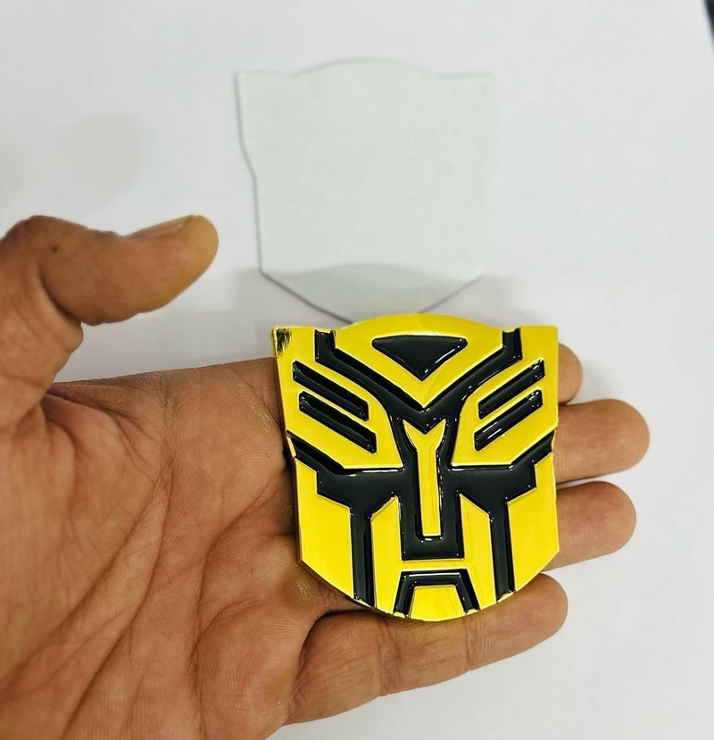 AUTO MT Emblems for Car & Bike Metal Lo.go and Grill Me.tal Lo.go, Auto Accessories for Car Emblem 3D Badge Auto Racing Sport Sticker Grand Tourer Decal. (Small Golden Black TRANSFORMERR Logo) - Image 3
