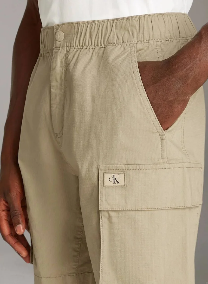 Calvin Klein Jeans Stone Gray Cargo Shorts for Men | Best Price UAE