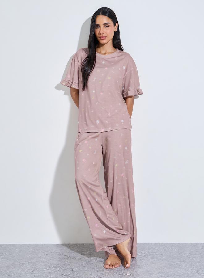Styli Pink All Over Print Ruffle Short Sleeves T-Shirt and Wide Leg Pants Pyjama Set - Image 1