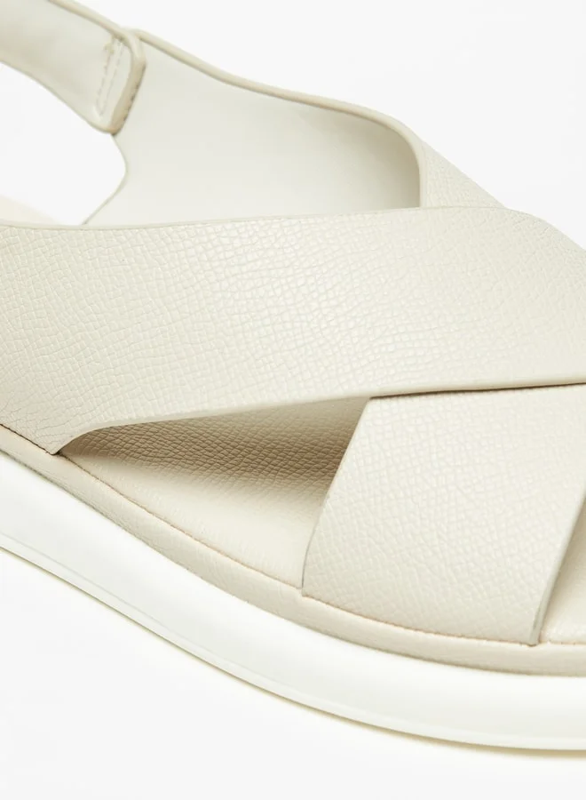 لو كونفورت Women's Solid Cross Strap Sandals with Hook and Loop Closure