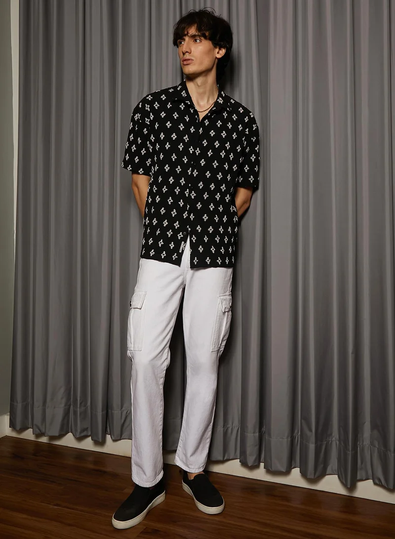 Campus Sutra Men's Midnight Black Floral-Tactile Oversized Shirt