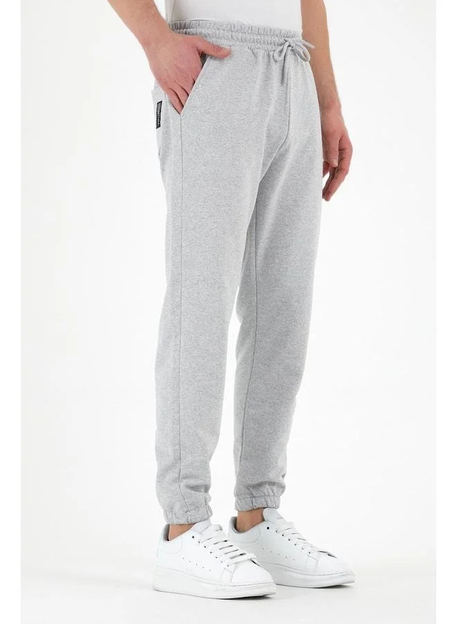 Mmetalic  Grey Men’s Sweatpants with Label, Back and Side Pockets, Regular Fit, Elastic Hem for Men | Best Price UAE