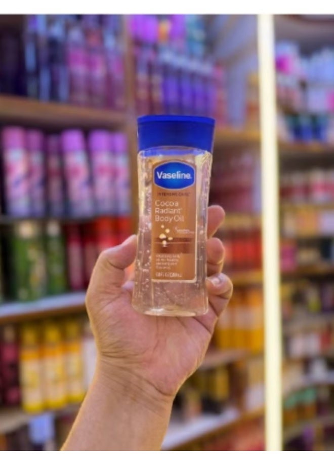 فازلين زيت فازلين بالعناية المكثفة بزبدة الكاكاو 200 مل  Vaseline Intensive Care Cocoa Radiant Body Oil لترطيب عميق ولمعان طبيعي للبشرة الجافة  سريع الامتصاص - Image 2