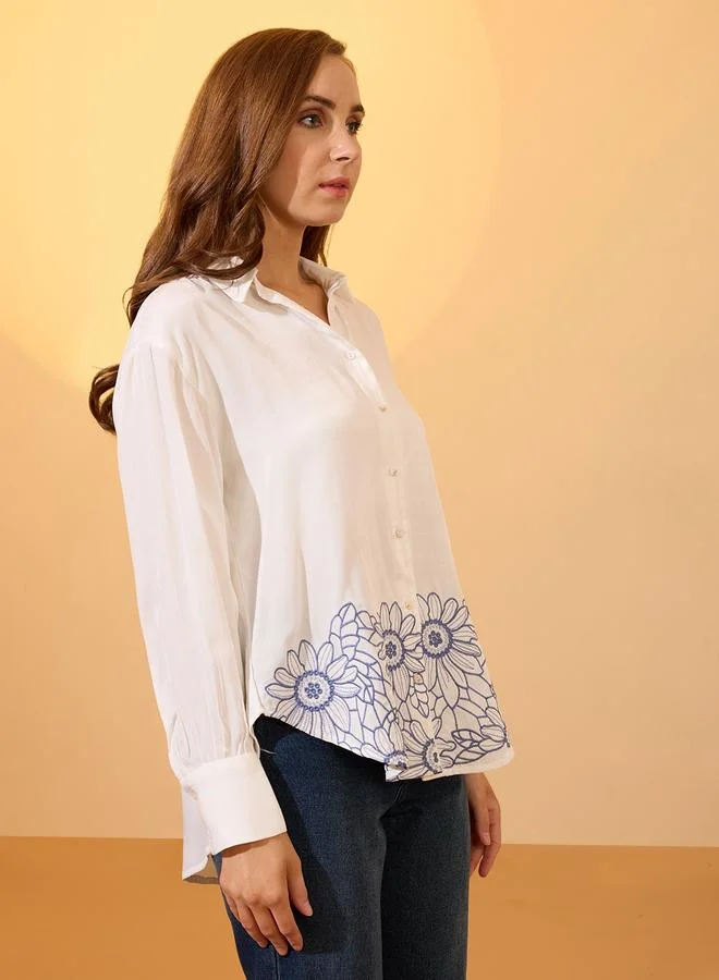 جلو باص بلوزة بتفاصيل زهور مُطرزة