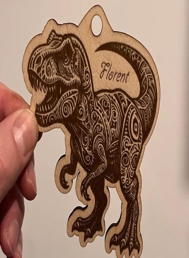 سلسلة مفاتيح ديناصور ثلاثية الأبعاد مصنوعة من الخشب بتقنية القطع بالليزر | حلقة مفاتيح خشبية محفور عليها تصميم تي-ريكس مع إمكانية إضافة اسم | سلسلة مفاتيح حيوانات خشبية مصنوعة يدويًا للأطفال، حقيبة مدرسية، هدايا، وإكسسوار لعبة قابل للتجميع - Image 1