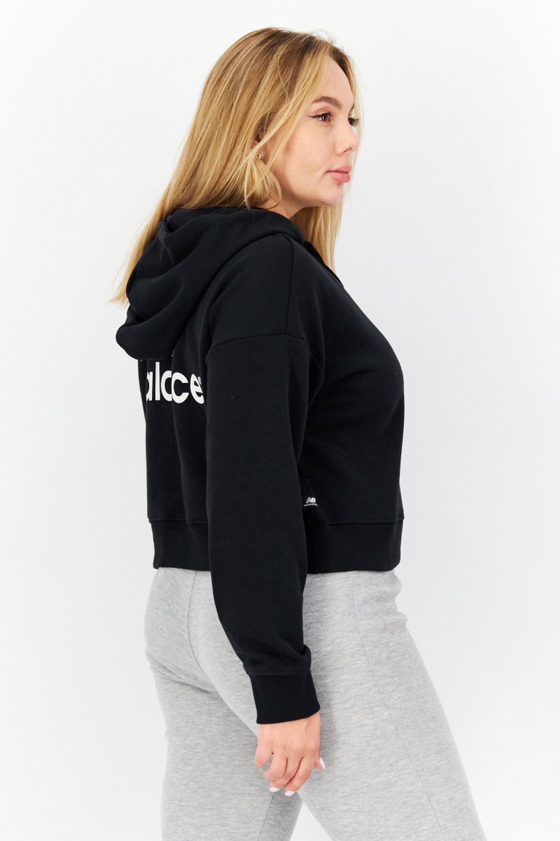 New Balance Women Relaxed Fit Training Crop Hoodie, Black - Image 2
