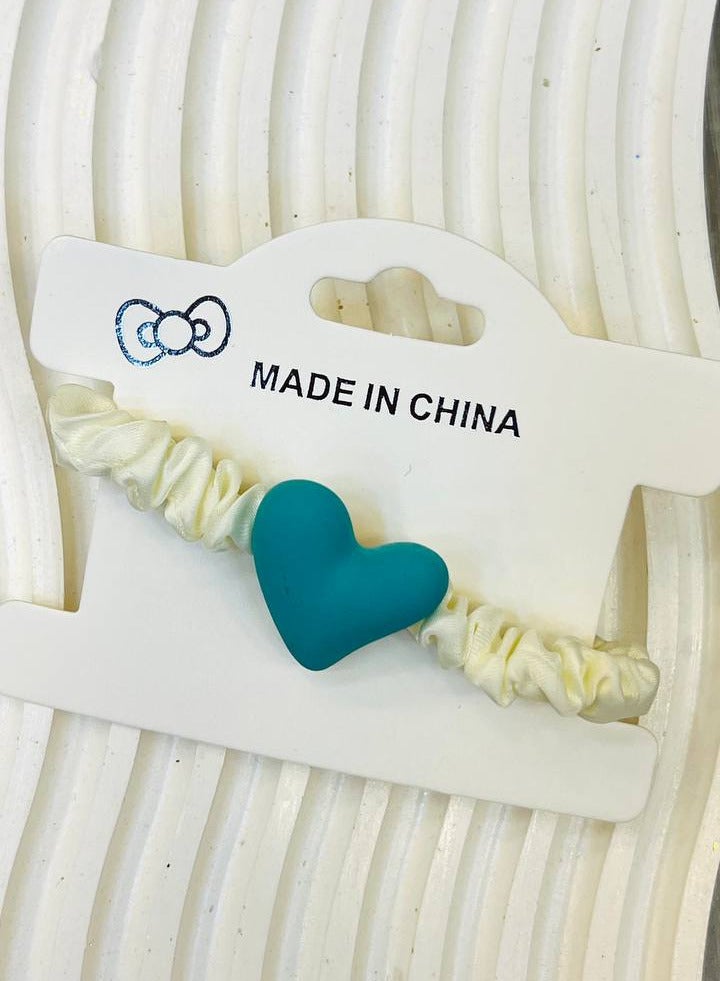 Generic Hair elastic for kids with an elegant heart design in the center — A delicate touch for your little one's beauty!
