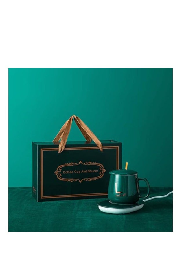 Thermal porcelain mug with porcelain lid equipped with an electric heater Equipped with a gold spoon that we use to heat the base and a plate to serve sweets Its base is a heater that can be used with any mug that maintains its temperature Multi-colored  - Image 1