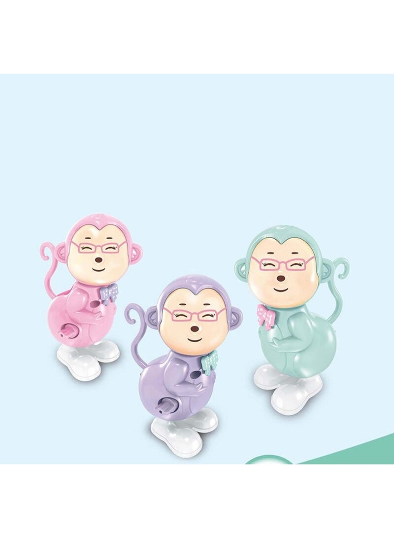 Toyland Pack of 12 pcs Wind Up Plastic Jumping Monkey Toy for Kids - Image 2