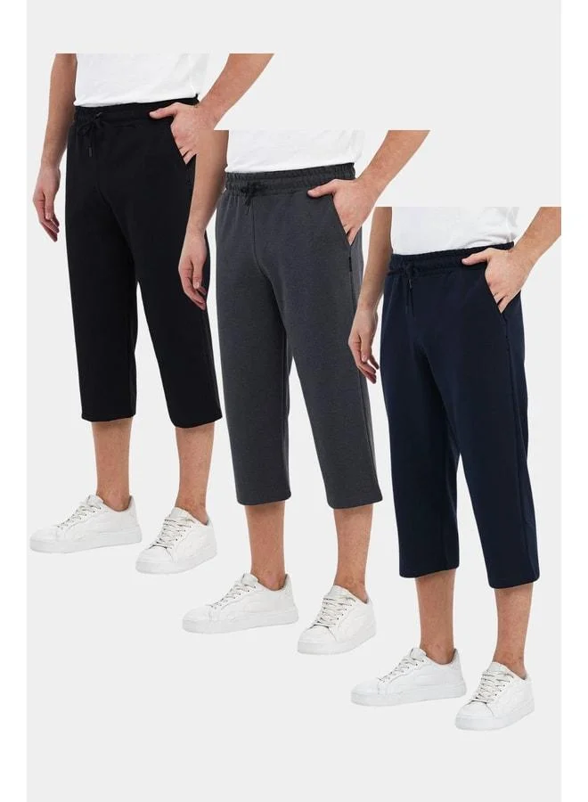 Men's Knee-Length Bermuda Capri Shorts with Three Side Pockets and an Adjustable Elastic Waist.