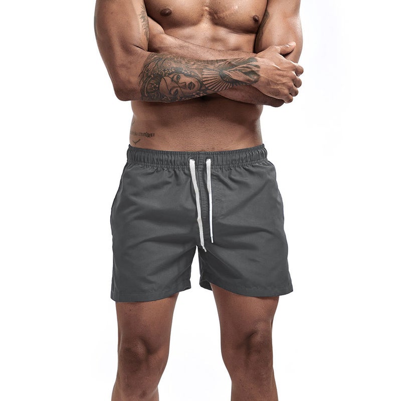UXH and solid color four-sided elastic breathable beach shorts without lining with pocket quick-drying loose multi-color beach pants - Image 1