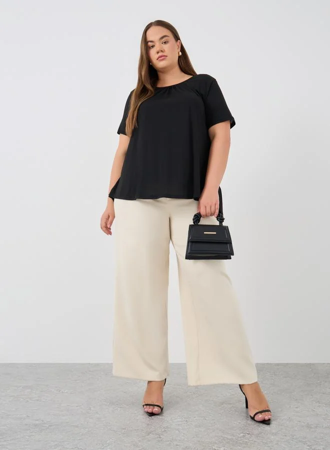 Styli Styli Plus Size Solid Tiered Back T-Shirt with Tie Detail