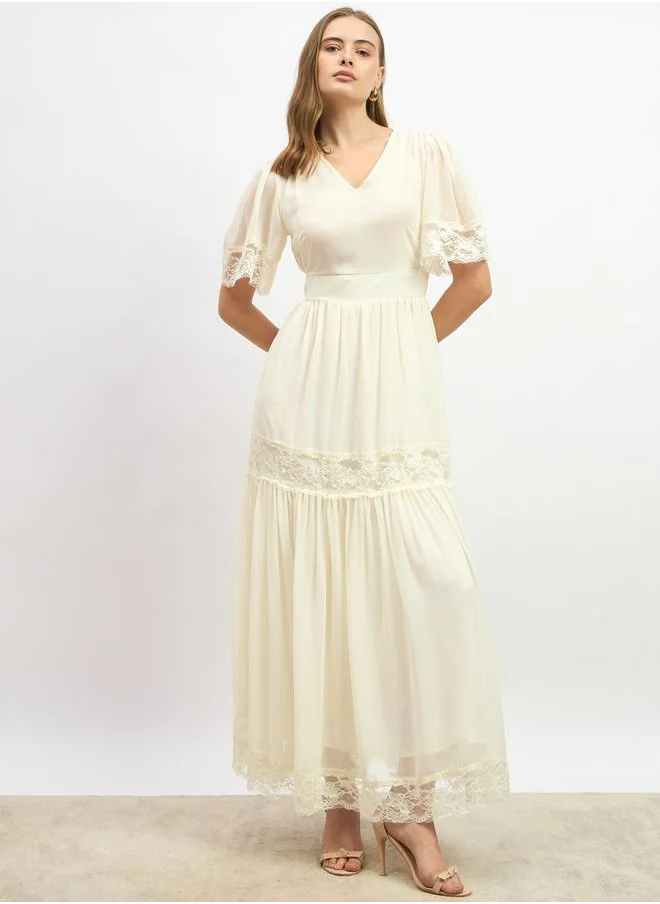 Styli Plain Flared Sleeves Tiered Maxi Dress with Lace Trim