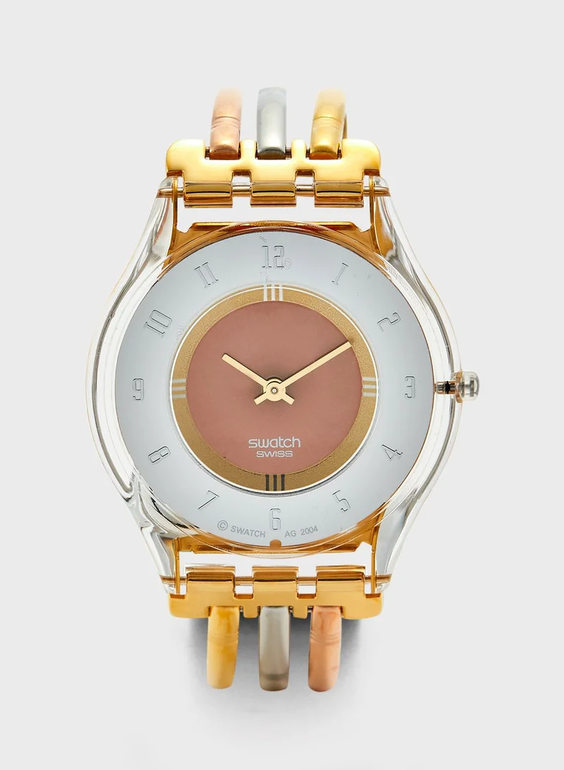 Swatch Tri-Gold Analog Watch