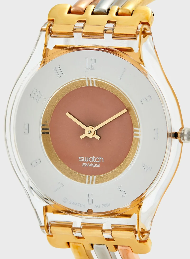 Swatch Tri-Gold Analog Watch