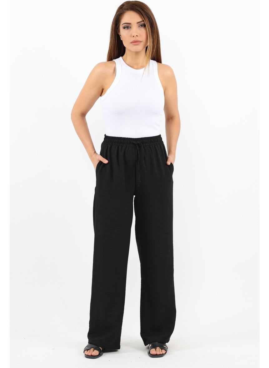 Ritnice - Women's Linen Comfy Black Straight Cut Elastic Waist Trousers - Image 1