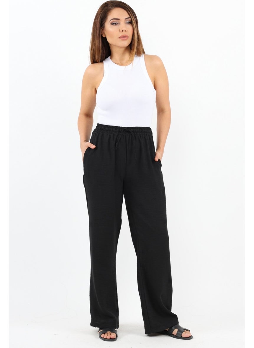 Ritnice - Women's Linen Comfy Black Straight Cut Elastic Waist Trousers - Image 1