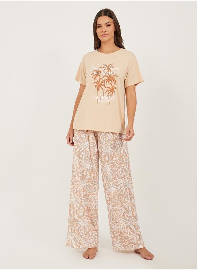 Styli Palm Printed Dropped Shoulder T-Shirt and Pyjama Pants Set  - Image 1