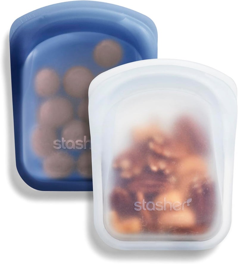Stasher Silicone Reusable Storage Bag, Pocket Bags 2-Pack, Microwave, Dishwasher, Oven Safe, Sous Vide, Eco Friendly, Leak-free, Food-safe Silicone Snack Bags for Travel, 4 oz, Clear & Deep Ocean - Image 1