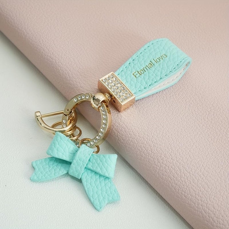 Turquoise and Gold Key Chain with Faux Leather Strap, Bow, Metal Frame with Shiny Stones