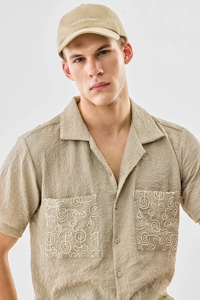 سنيتش قميص مطرز بقصة صندوقية وجيبين