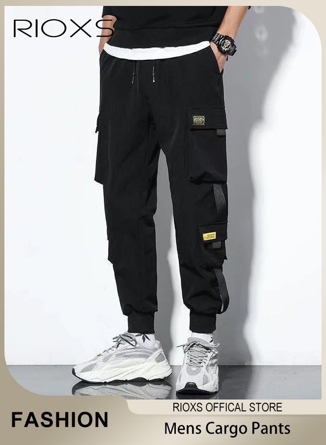 ريوكس بنطلون كارغو رجالي، بنطلون بانك فضفاض غير رسمي مع جيوب متعددة، بنطلون رياضي رجالي بخصر مطاطي ورباط عند الكاحل، بنطلون رياضي خفيف الوزن ومسامي، بنطلون هيب هوب، بنطلون رياضي للارتداء اليومي/الشعبي، أسود - Image 1