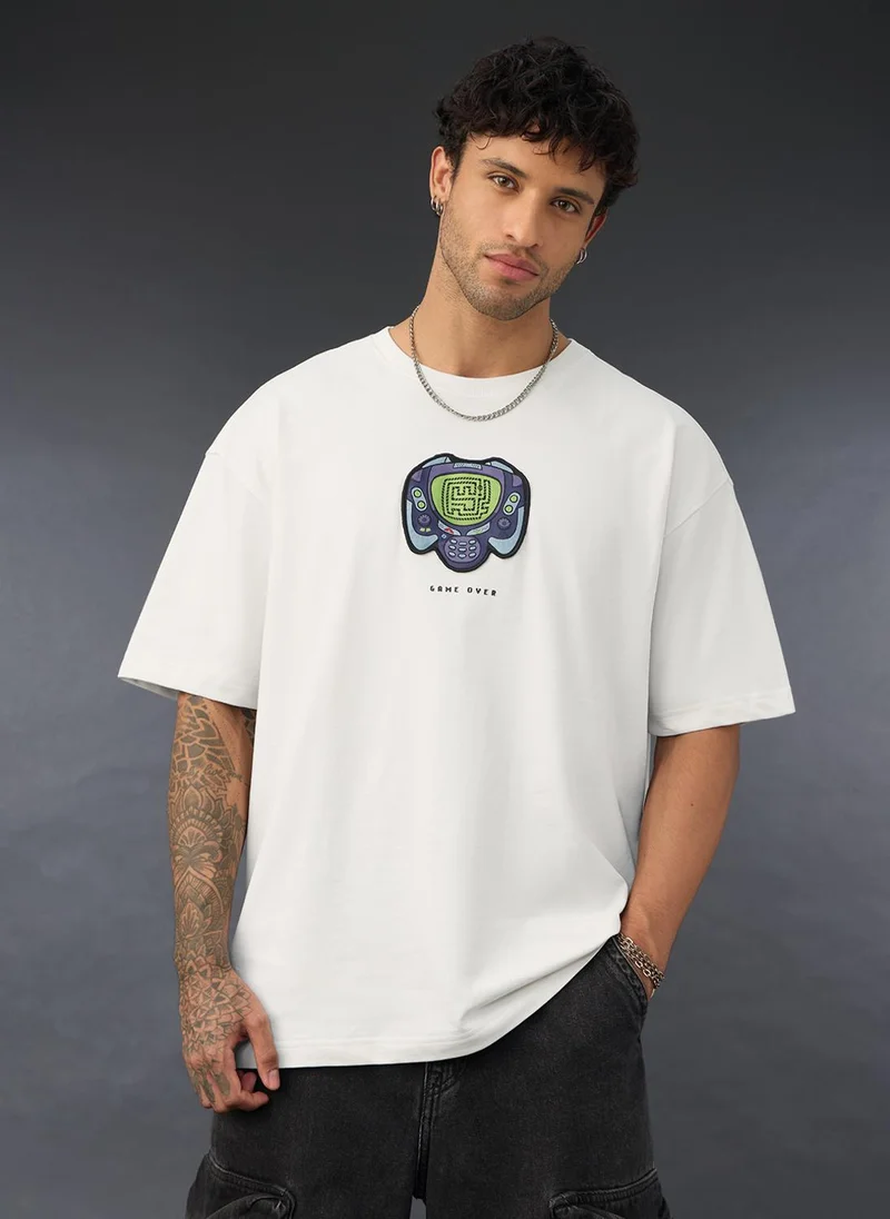 ذا سوليد ستور Oversized T-Shirt: Snake Game