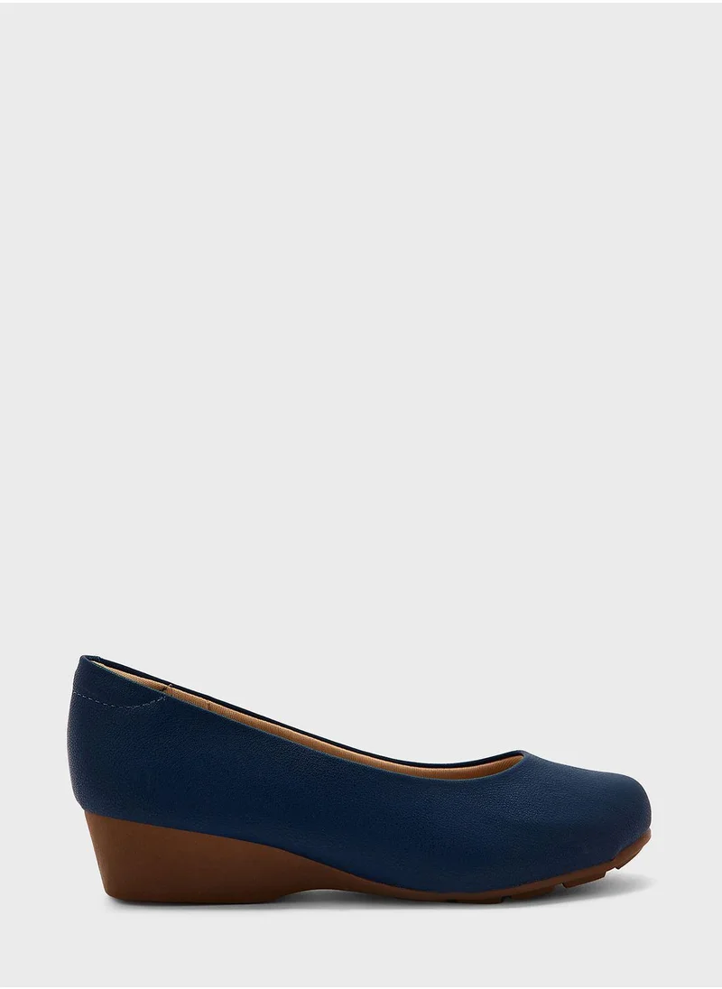 MODARE Ankle Strap Mid Heel Pumps