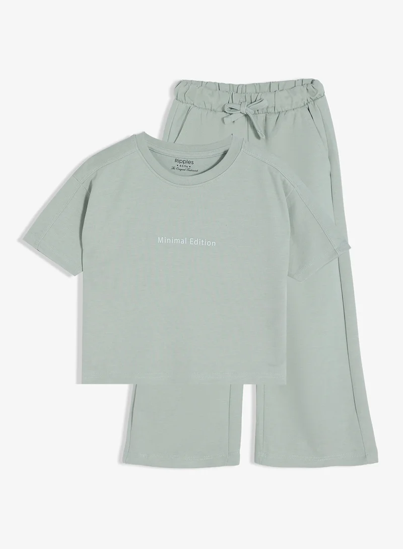 ريبلز مع نمشي طقم بناتي بلوزة بياقة دائرية وبنطلون واسع