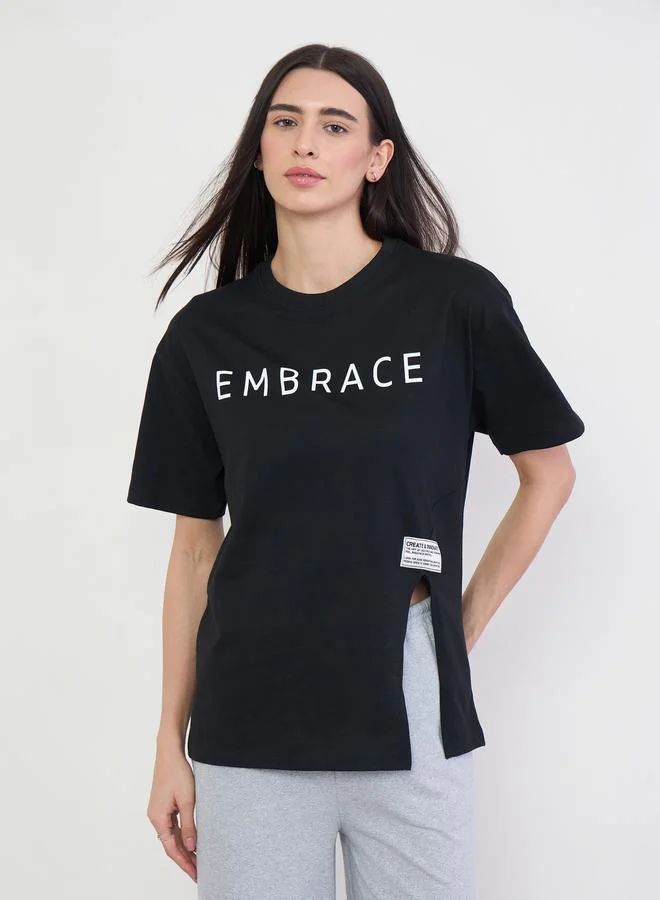 Styli Black 100% Cotton Oversized T-Shirt with Slit and Badge Detail