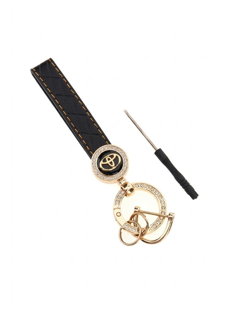 Toyota car key fob with padded strap and gold key ring, black color
