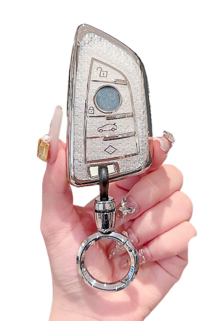 OUYoo غطاء مفتاح OUYoo مع سلسلة مفاتيح، صدفة معدنية متوافقة مع سيارات BMW من السلاسل 2، 5، 6، 7، X1، X2، X3، X5 وX6. غطاء TPU فاخر شامل للمفتاح الذكي مع سلسلة مفاتيح. (لون أبيض). - Image 1