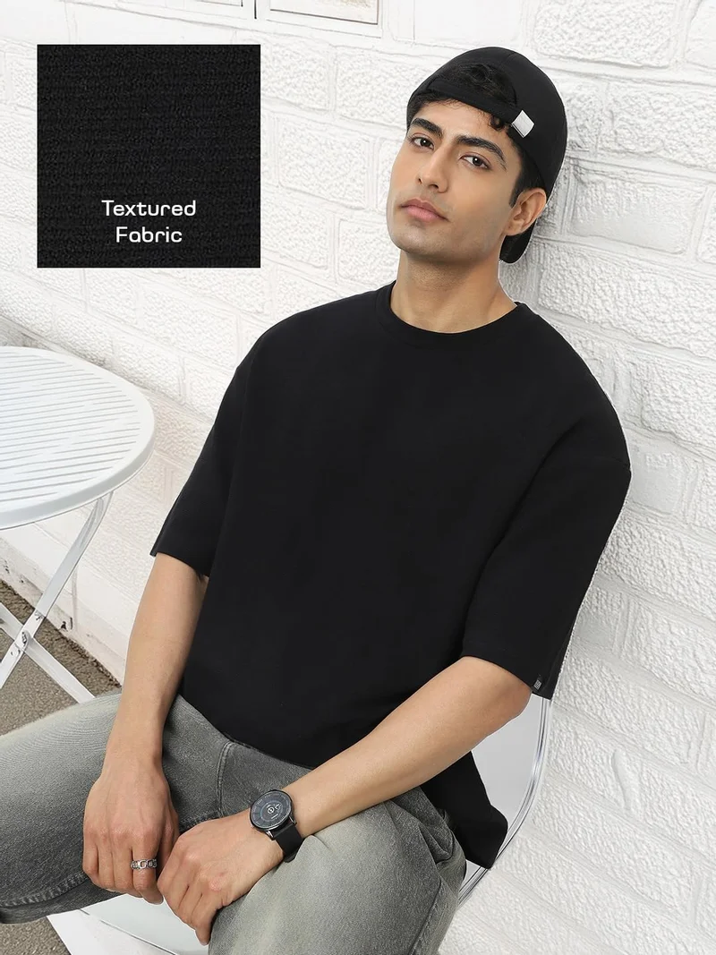 Urbano Fashion  Urbano Fashion Men's Black Textured Round Neck Oversized Half Sleeve Cotton T-Shirt  | Best Price UAE