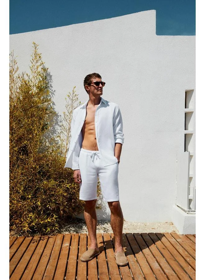 GRIMELANGE Jens Men's 100% Cotton Muslin Fabric Side-Pocket Slim Fit Narrow Cut White Shorts.