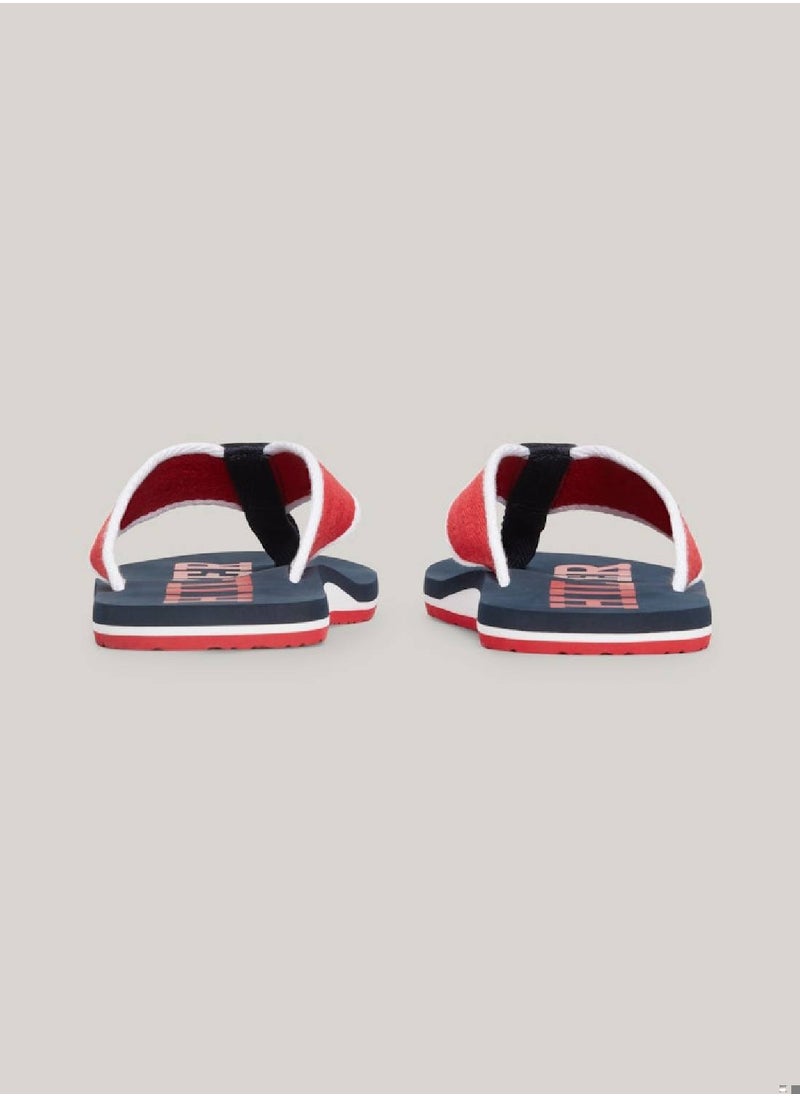 TOMMY HILFIGER - Men's Hilfiger Monotype Webbing Strap Flip-Flops -  Polyester webbing upper, Red - Image 1
