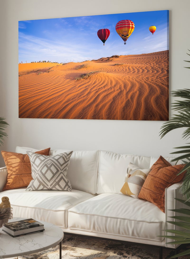 LOWHA Canvas Wall Art Stretched Over Wooden Frame with Scenery of Hot Air Balloons Flying Over Sand Dunes - Image 1