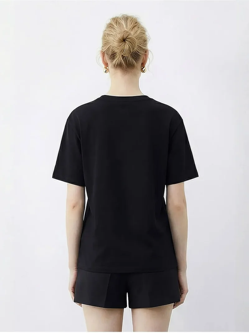 Bianco Lucci Black LUCCI Crew Neck Sequin Text Print T-Shirt for Women | Best Price UAE