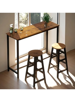 3-piece dining table set, consisting of one high table and two high chairs. It is a high-height kitchen table with seats in a modern and contemporary design and a steel frame. It is placed in the kitchen, dining room, living areas, and social areas. It is a rustic brown color with a black metal frame. It is durable and can be used in the kitchen, living room, dining room, or office. You can use the table as a coffee corner, a work desk, an entrance console, behind the sofa, or as a buffet for appetizers and drinks when needed. The chairs can be used during occasions as additional chairs or as a corner table. In some corners, vases or plant pots can be placed on it. The seat is round and has a soft texture that is not scratched. The chair has comfortable footrests when sitting on it. These details and design touches make you sit more comfortably. Easy to assemble and assemble - pzsku/Z3F98732E2D33EF6952B1Z/45/1745071166/c306c22e-dd01-416e-887c-7d6495542dd8