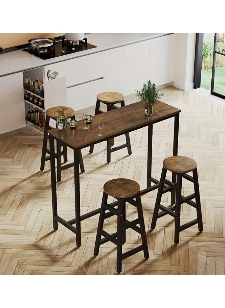 3-piece dining table set, consisting of one high table and two high chairs. It is a high-height kitchen table with seats in a modern and contemporary design and a steel frame. It is placed in the kitchen, dining room, living areas, and social areas. It is a rustic brown color with a black metal frame. It is durable and can be used in the kitchen, living room, dining room, or office. You can use the table as a coffee corner, a work desk, an entrance console, behind the sofa, or as a buffet for appetizers and drinks when needed. The chairs can be used during occasions as additional chairs or as a corner table. In some corners, vases or plant pots can be placed on it. The seat is round and has a soft texture that is not scratched. The chair has comfortable footrests when sitting on it. These details and design touches make you sit more comfortably. Easy to assemble and assemble
